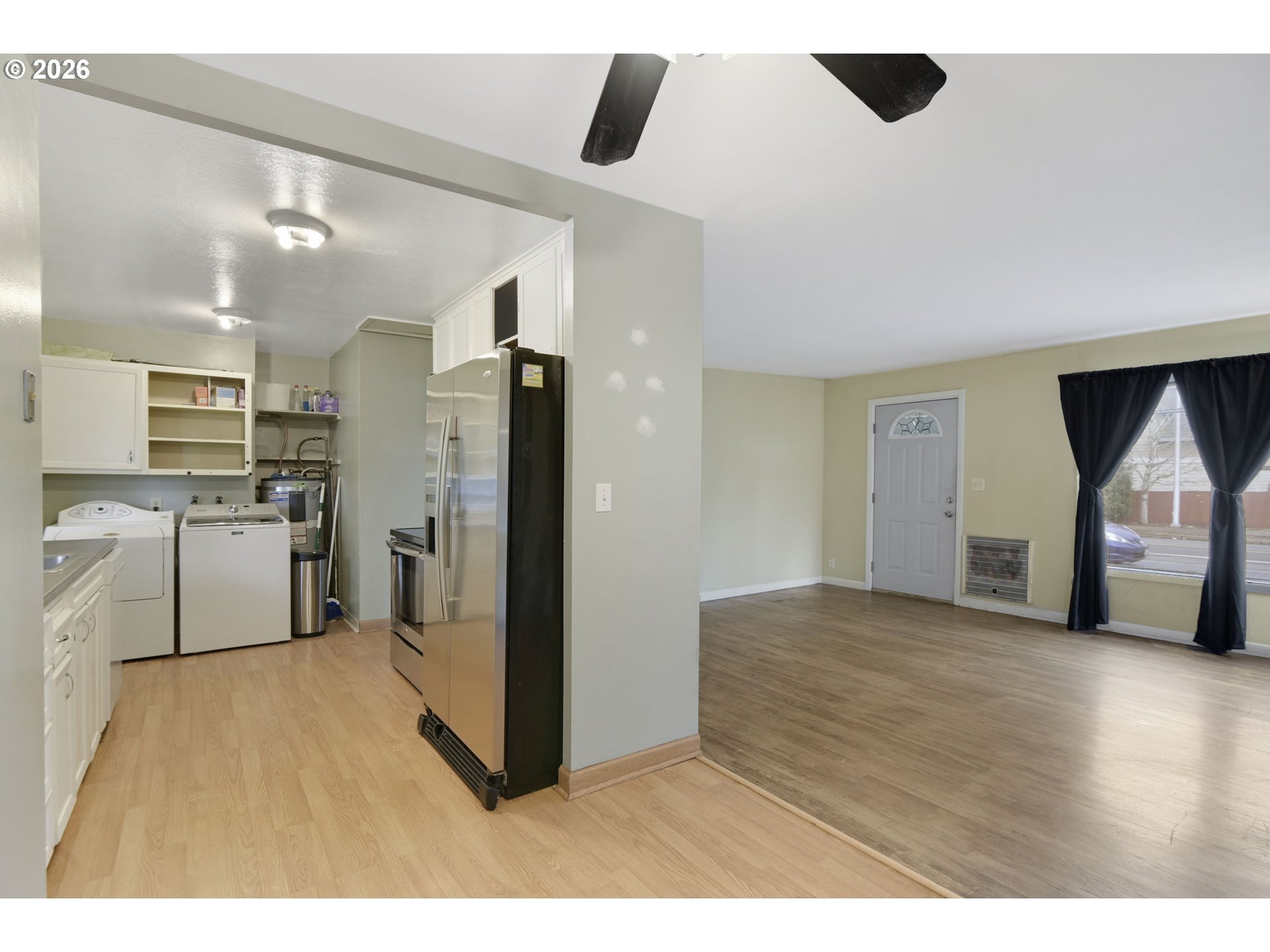 106 North Lieser Road Vancouver, WA 98664 - Photo 15 of 36 a kitchen with stainless steel appliances kitchen island granite countertop a refrigerator and a sink