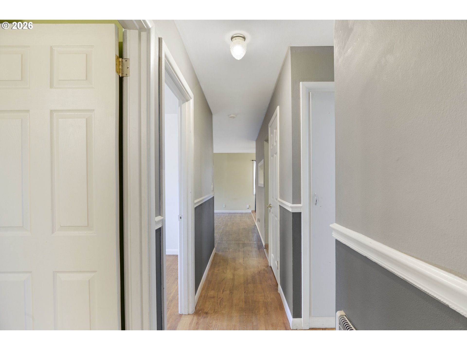 106 North Lieser Road Vancouver, WA 98664 - Photo 18 of 36 a view of a hallway with wooden floor and staircase
