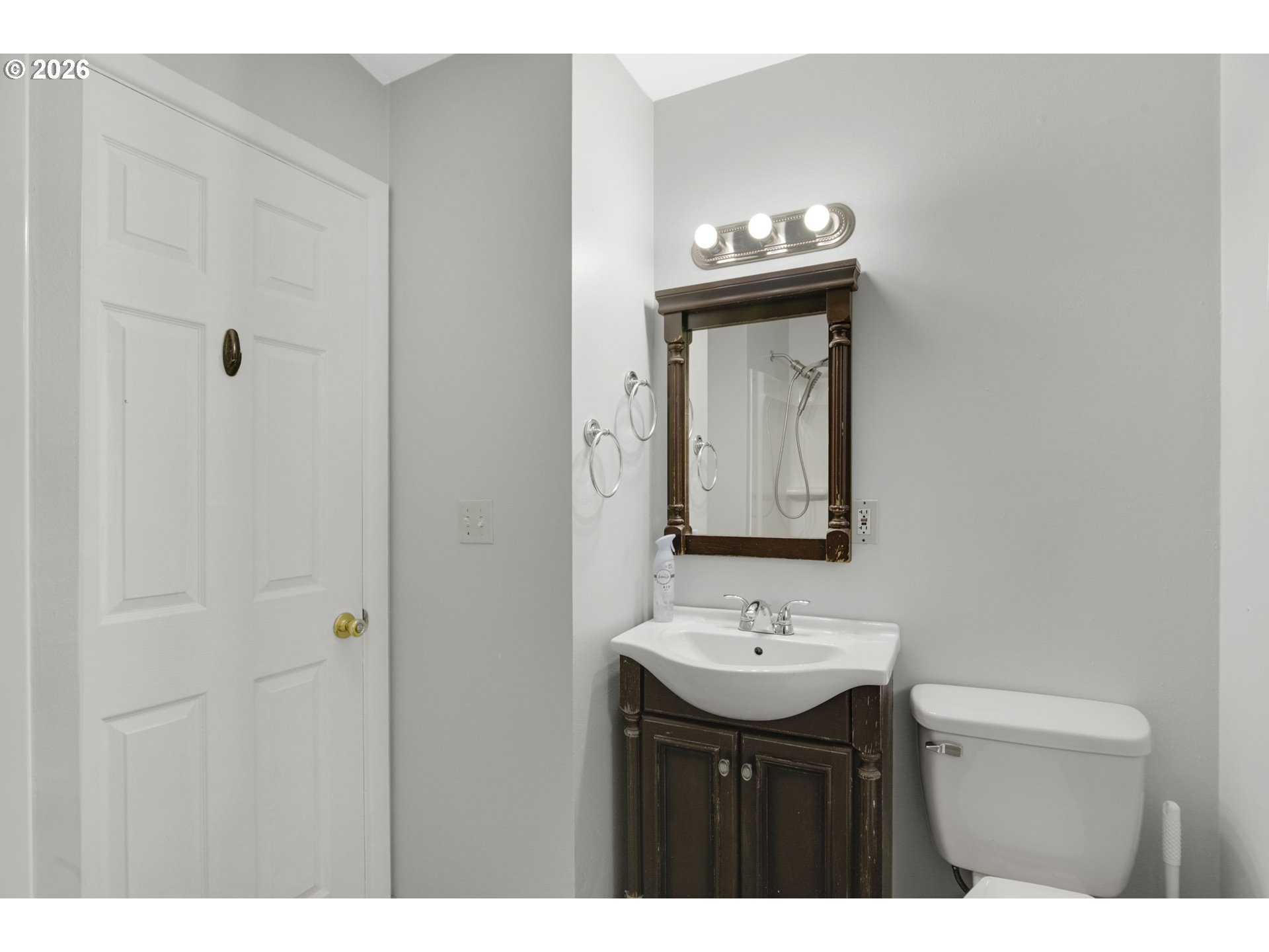 106 North Lieser Road Vancouver, WA 98664 - Photo 20 of 36 a bathroom with a sink vanity and a mirror