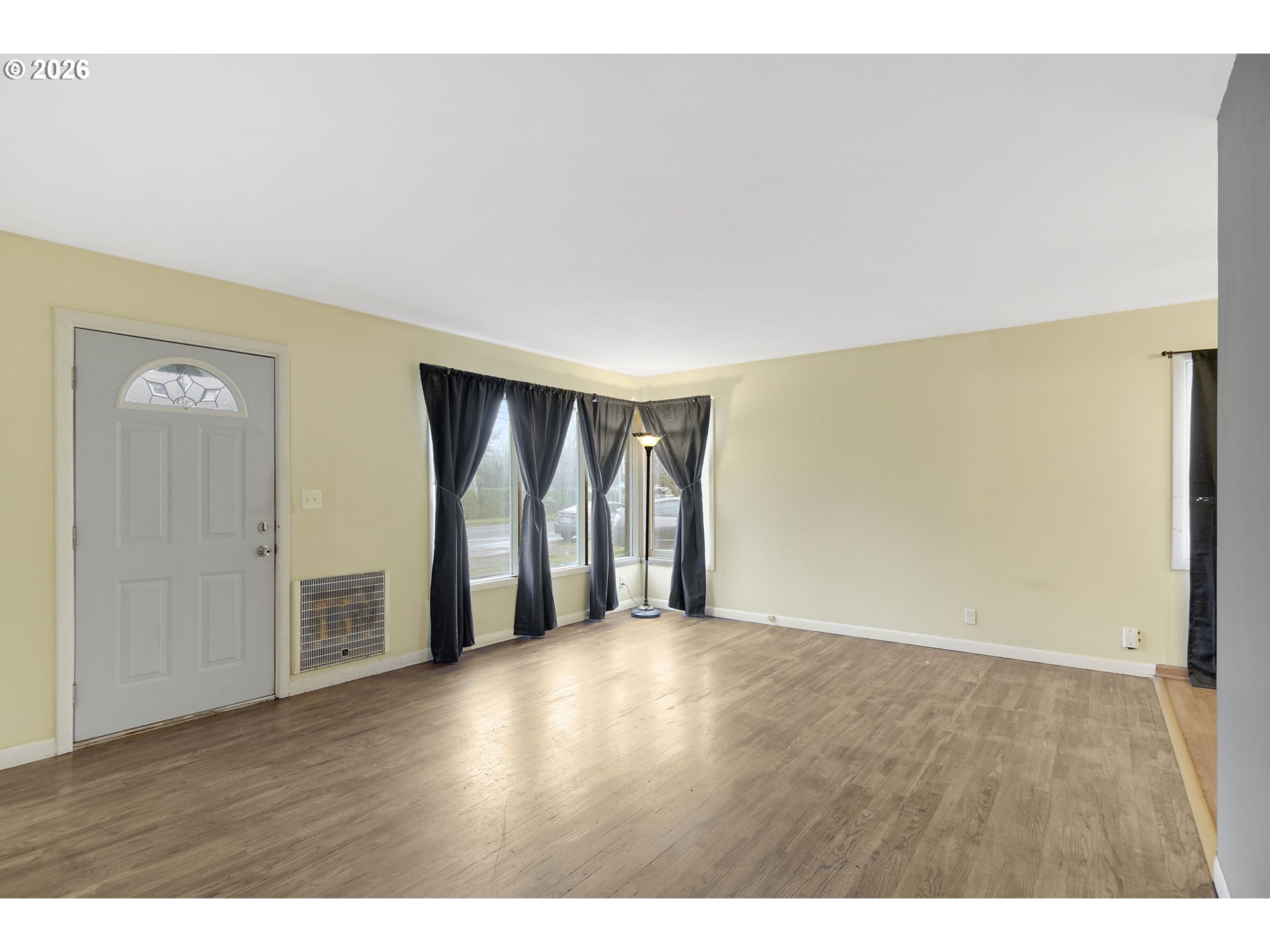 106 North Lieser Road Vancouver, WA 98664 - Photo 5 of 36 a view of an empty room with wooden floor