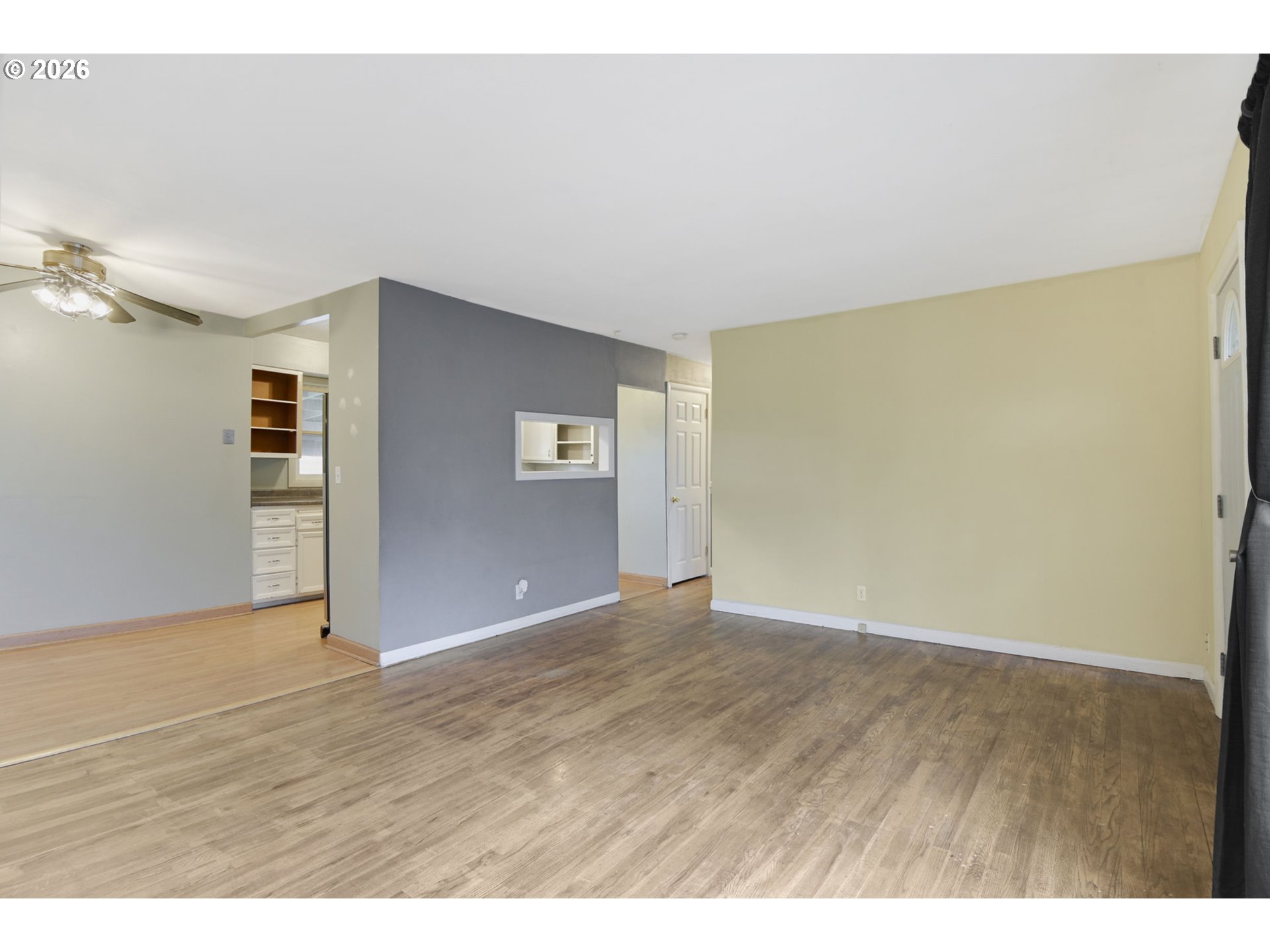 106 North Lieser Road Vancouver, WA 98664 - Photo 9 of 36 a view of an empty room with wooden floor