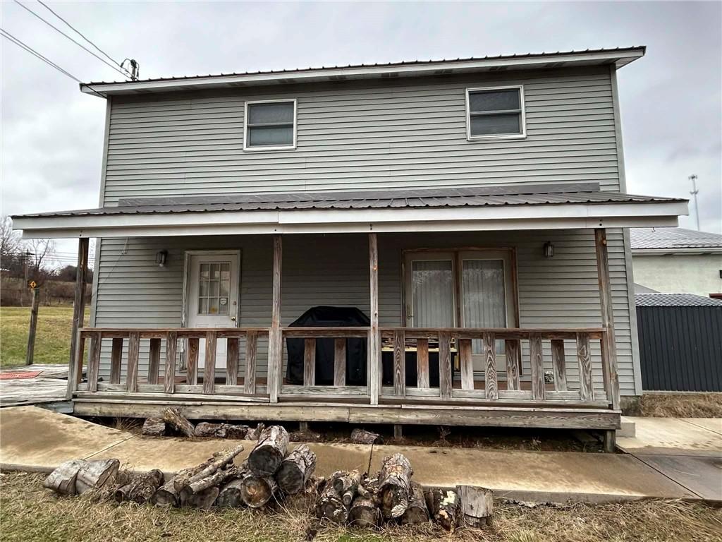a view of a house with a roof deck