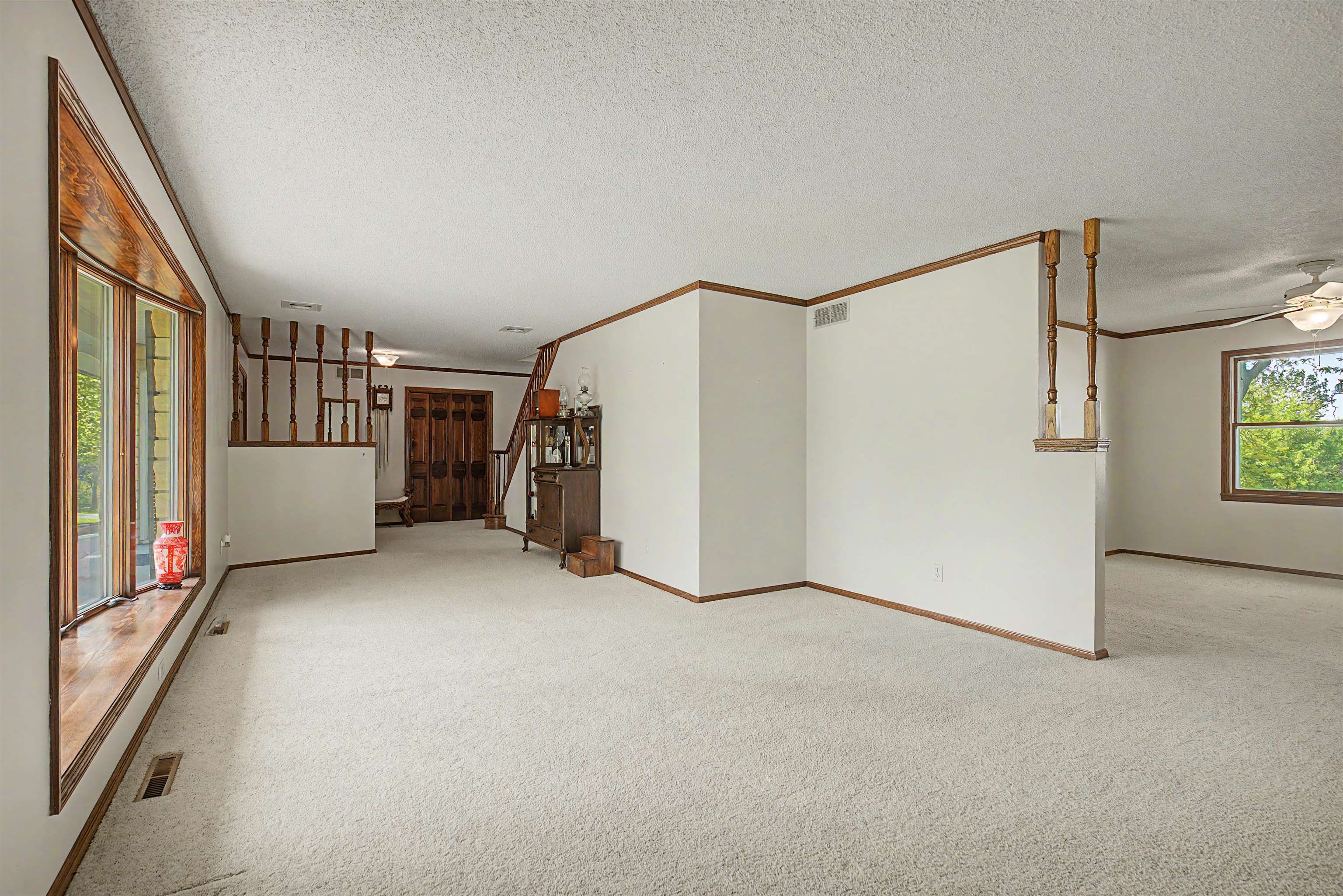 17380 Corbett Road Mount Carroll, IL 61053 - Photo 6 of 65 a view of an empty room with a window