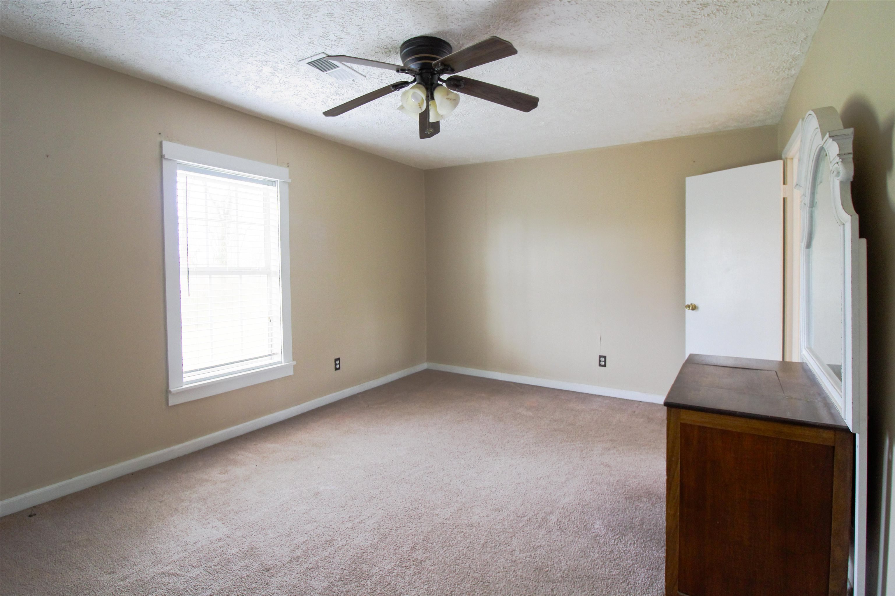 4075 Arp Central Road Ripley, TN 38063 - Photo 16 of 37 Spacious Room with carpet, & large closet