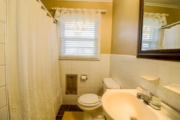 a bathroom with a sink and a toilet