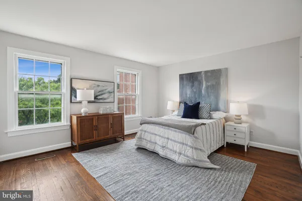 a room with a bed and a window