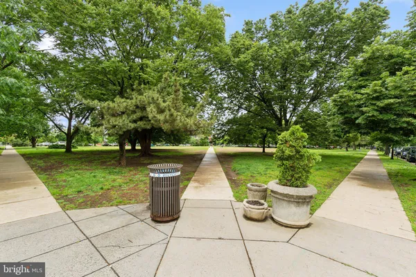 a view of a patio with a fountain