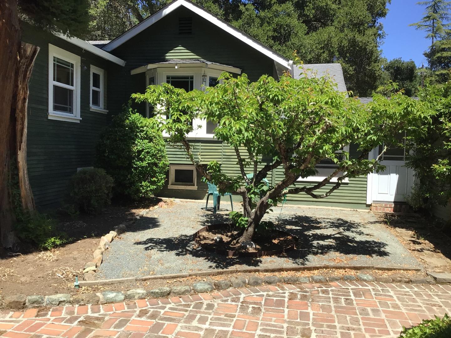 650 Whiskey Hill Road, Unit INLAW Woodside, CA 94062 - Photo 7 of 8 a front view of a house with a yard