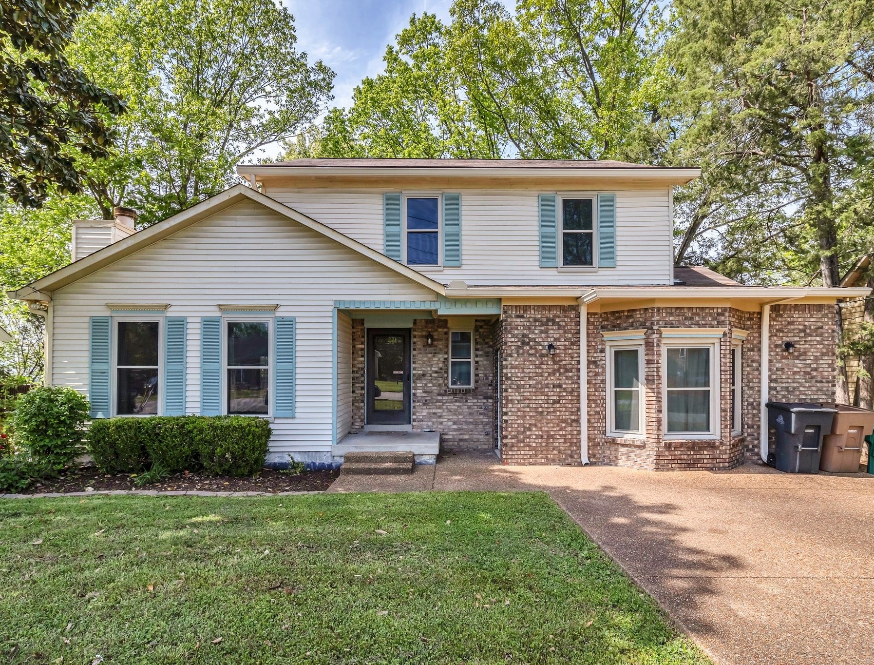 853 Bishopsgate Road Antioch, TN 37013 - Photo 1 of 41 a front view of a house with garden