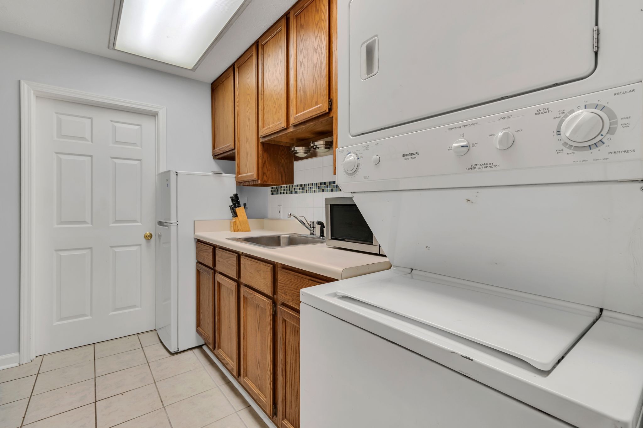 853 Bishopsgate Road Antioch, TN 37013 - Photo 6 of 41 a utility room with dryer and washer