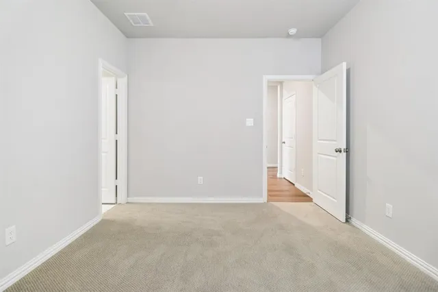 an empty room with an entryway