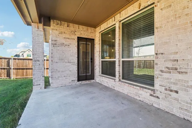 a view of outdoor space and front door