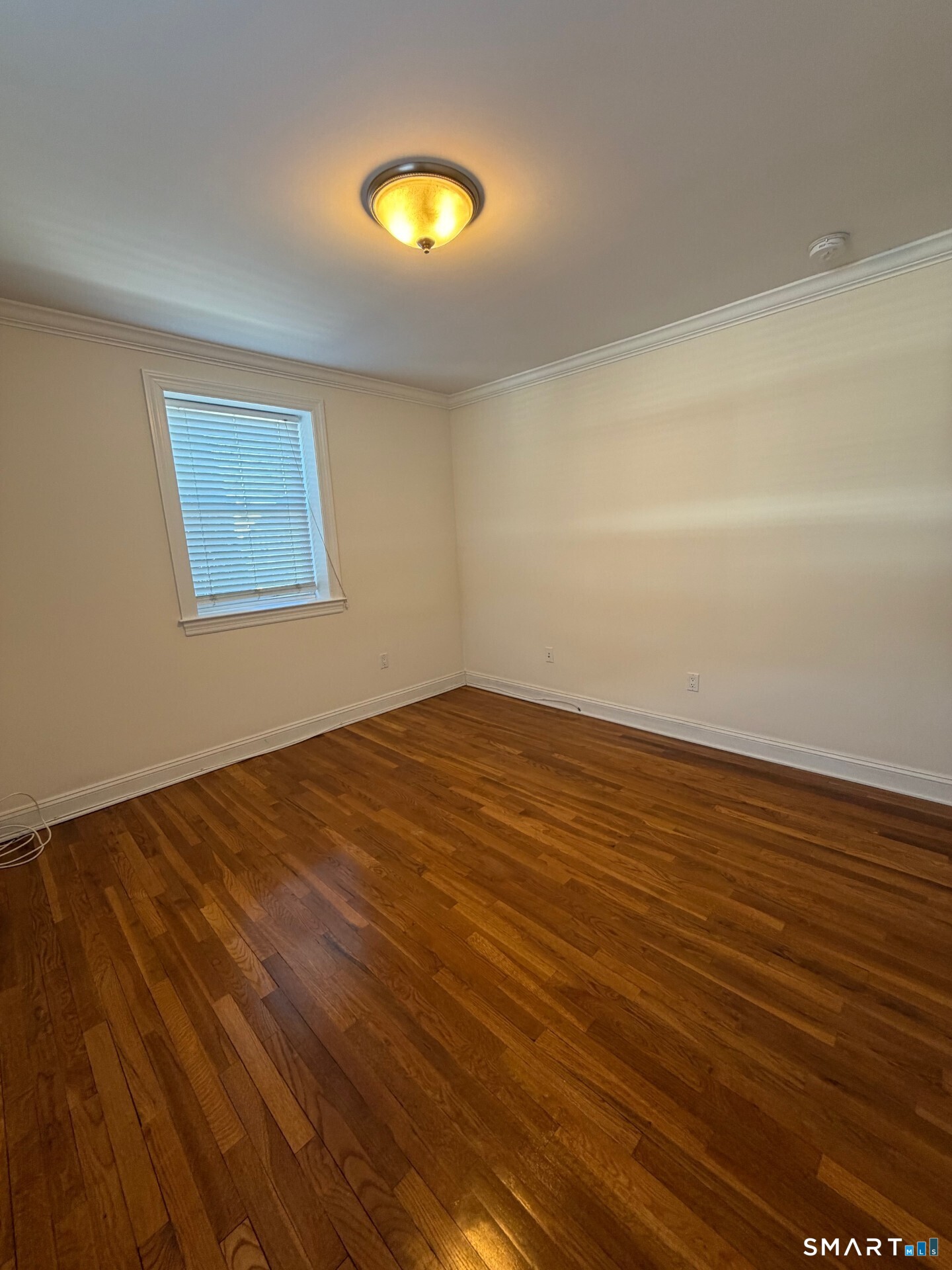 391 Reef Road, Unit 1A Fairfield, CT 06824 - Photo 12 of 24 a view of an empty room