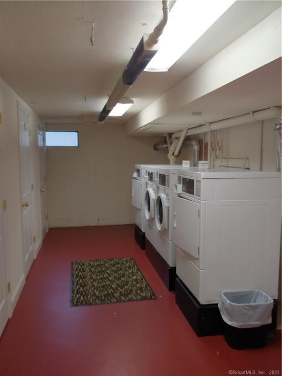 391 Reef Road, Unit 1A Fairfield, CT 06824 - Photo 17 of 24 a utility room with dryer and washer