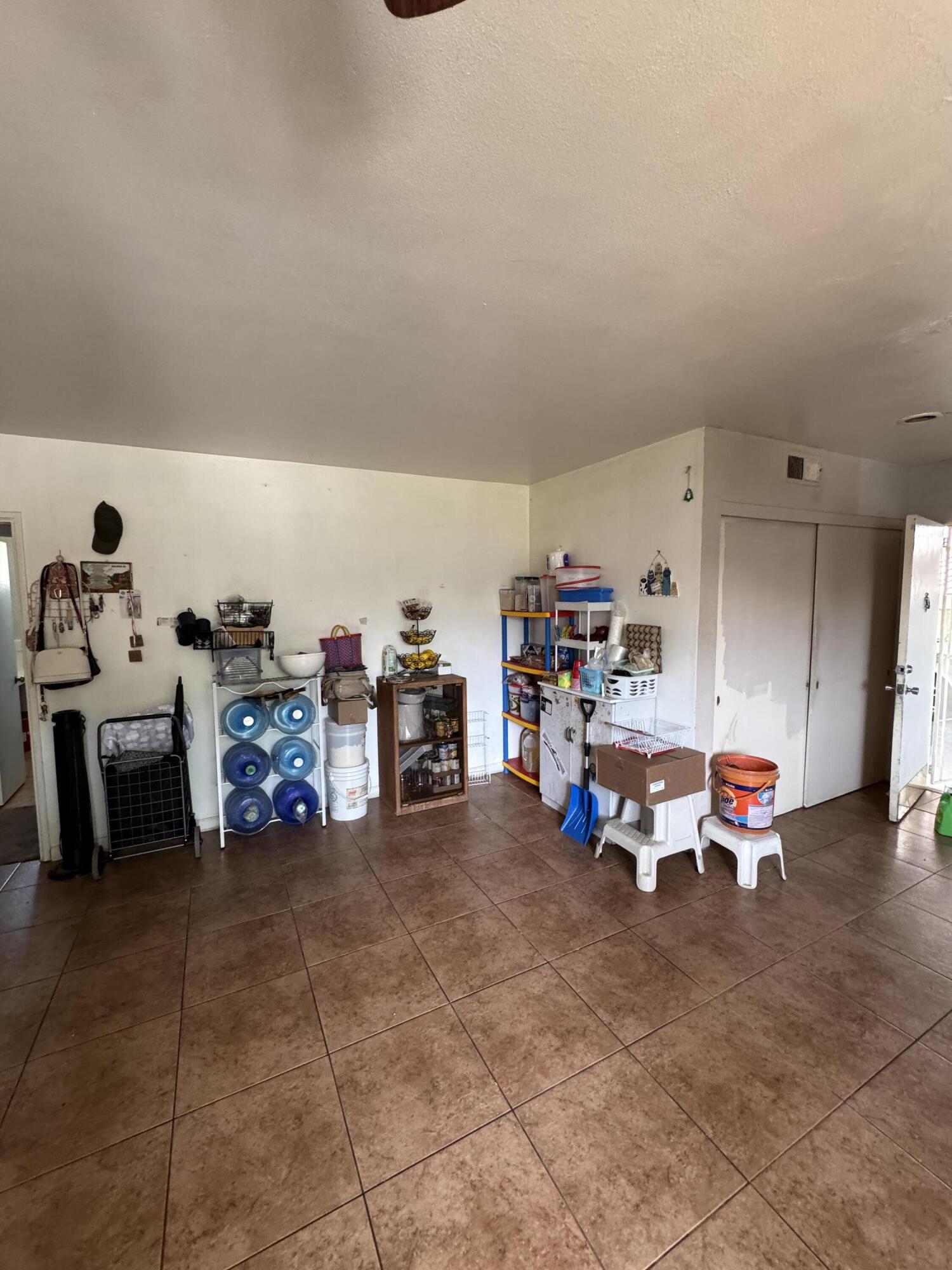 704 North Floral Street Visalia, CA 93291 - Photo 12 of 51 a view of a storage in a room