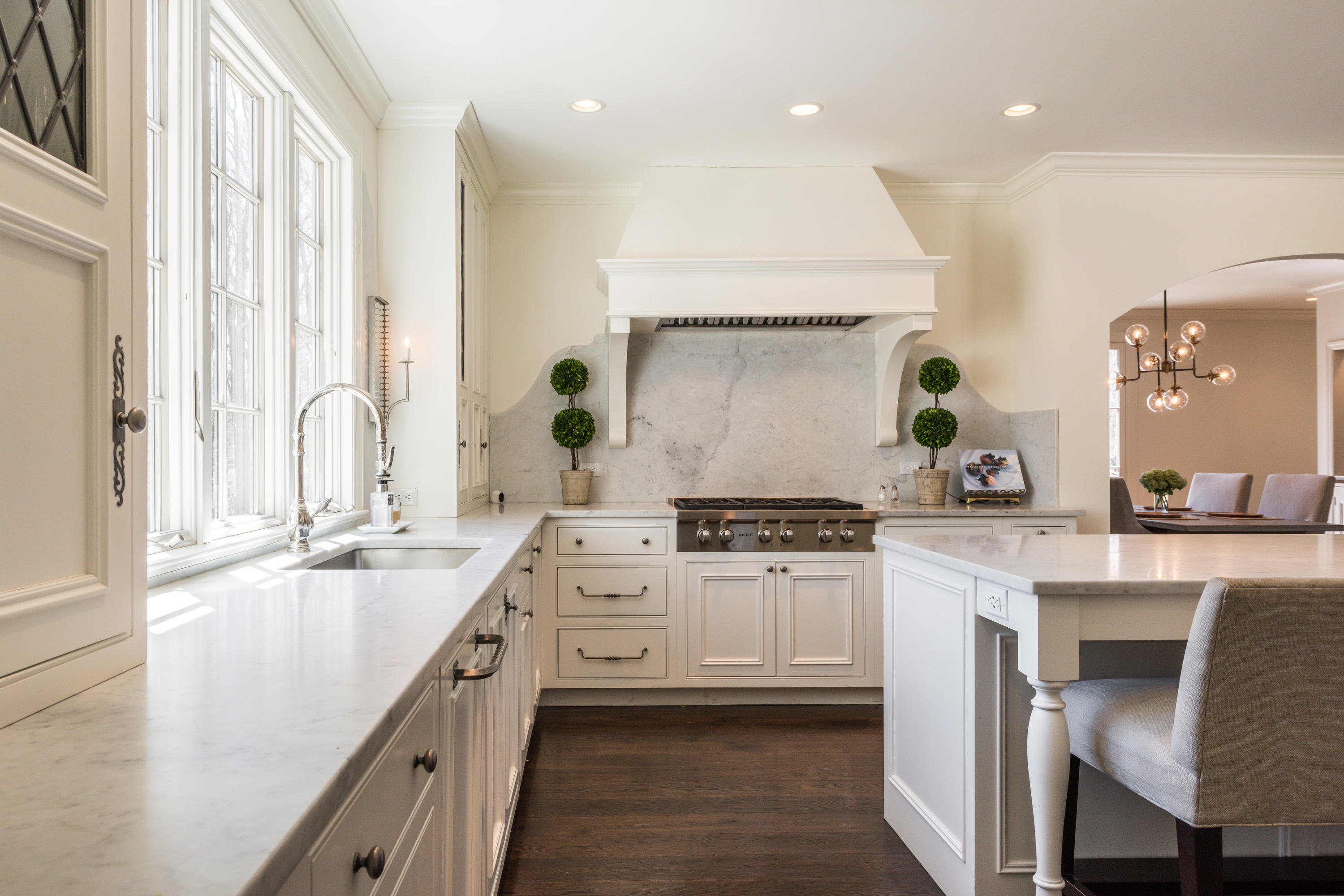 15 Indian Spring Trail Darien, CT 06820 - Photo 13 of 37 a large kitchen with stainless steel appliances granite countertop a sink and a stove