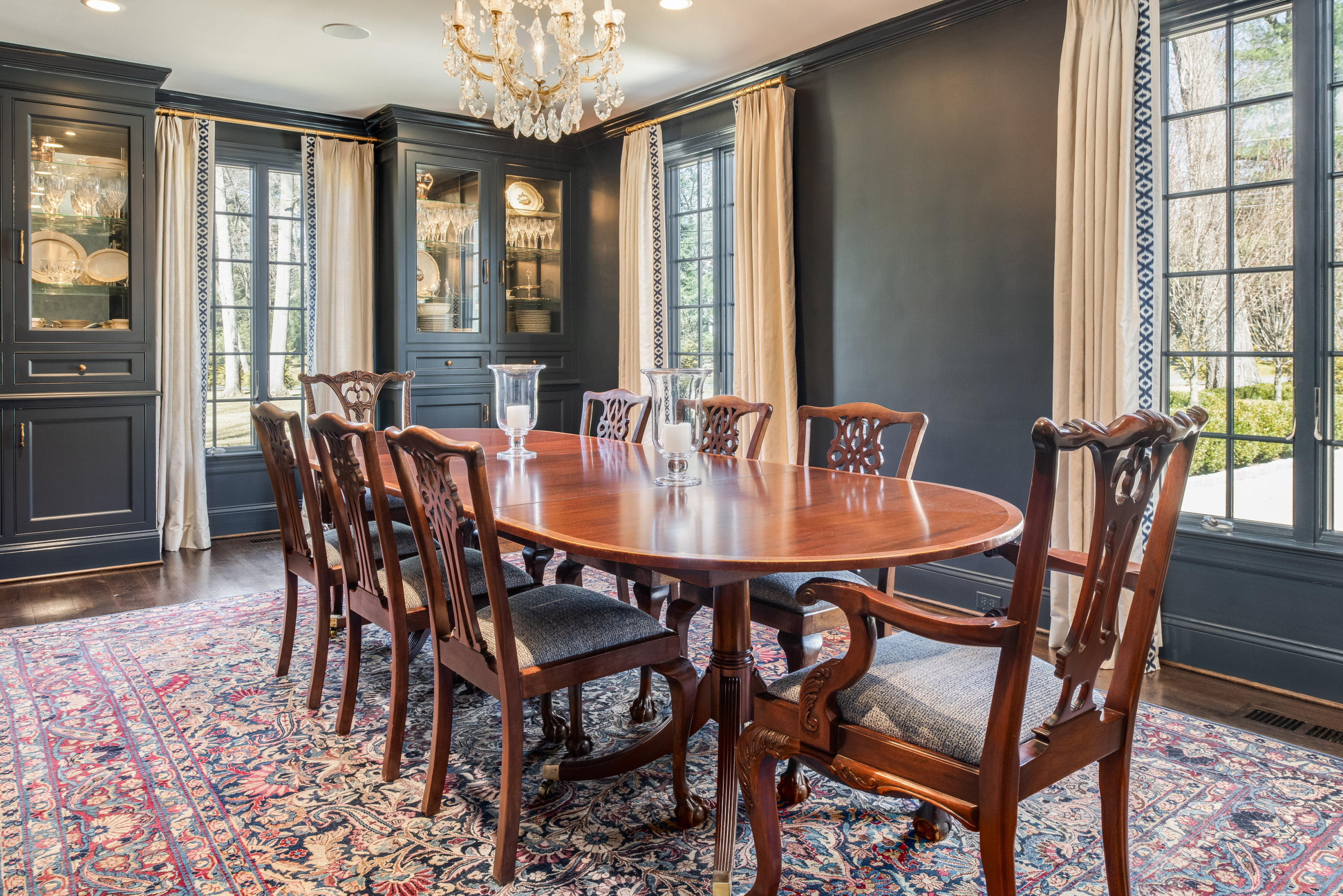 15 Indian Spring Trail Darien, CT 06820 - Photo 17 of 37 a view of a dining room with furniture window and outside view