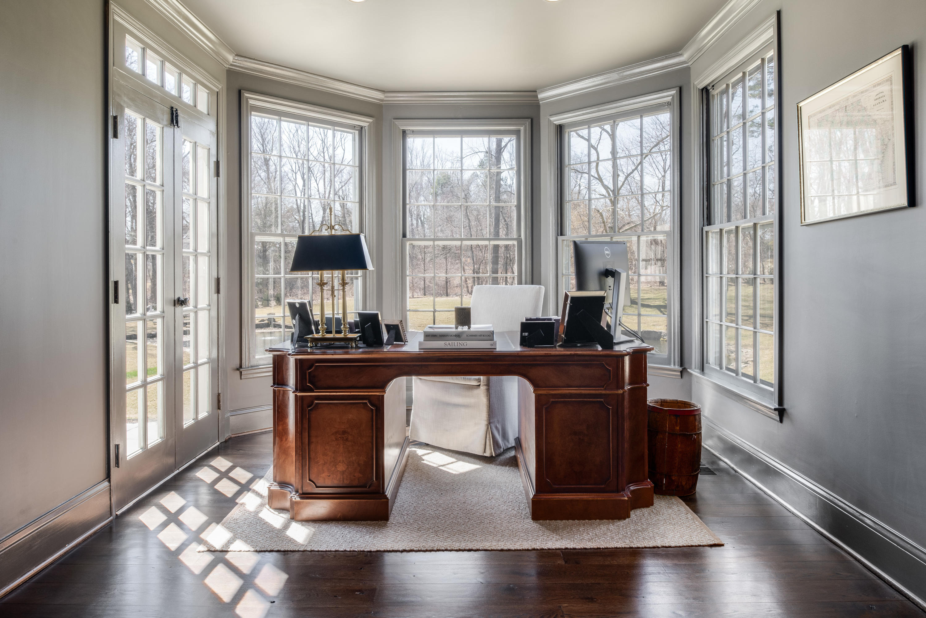 15 Indian Spring Trail Darien, CT 06820 - Photo 22 of 37 a living room with a large window and wooden floor