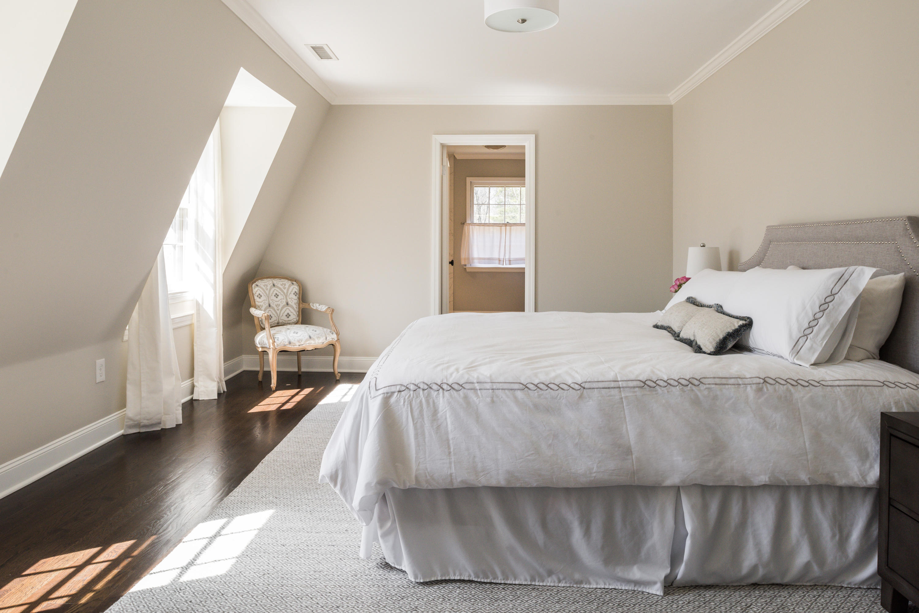 15 Indian Spring Trail Darien, CT 06820 - Photo 24 of 37 a bedroom with a bed and mirror