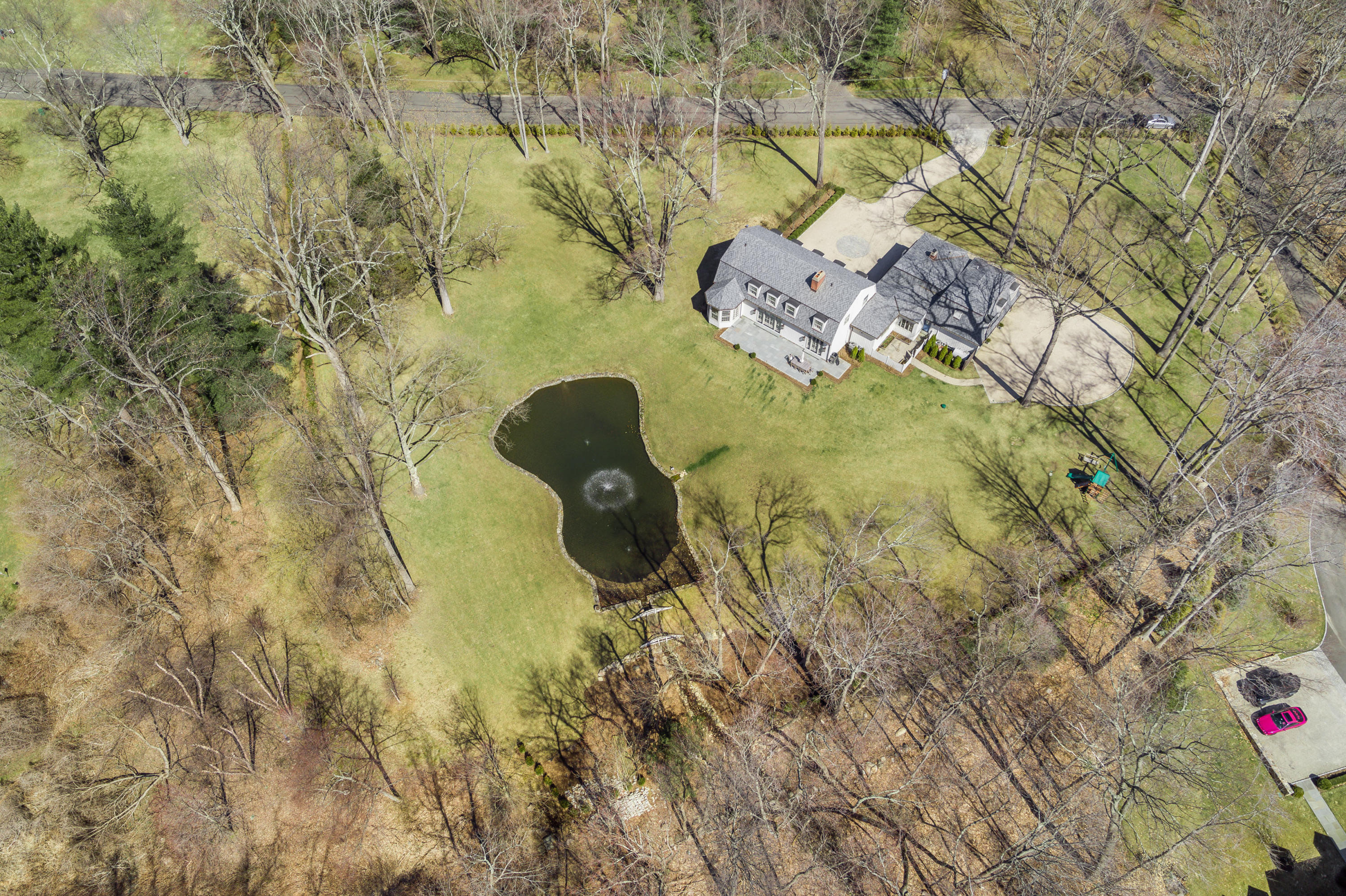 15 Indian Spring Trail Darien, CT 06820 - Photo 5 of 37 a aerial view of a house with a yard