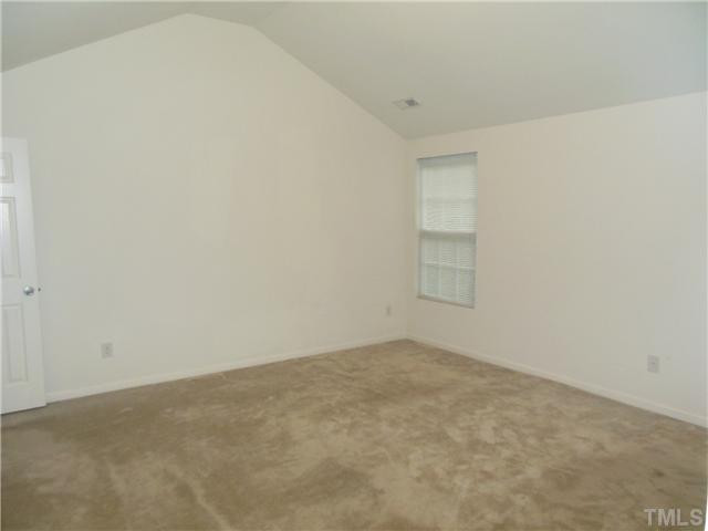 2046 Spring Creek Drive Durham, NC 27704 - Photo 6 of 10 a view of an empty room