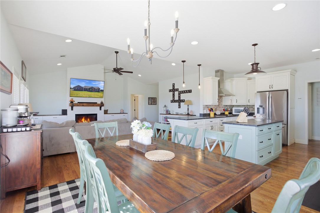 426 Oak Creek Road Seneca, SC 29678 - Photo 13 of 50 This inviting space combines a cozy living area with a functional kitchen, ideal for entertaining.