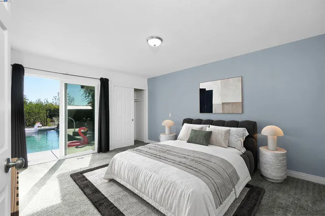 a bathroom with a toilet and shower