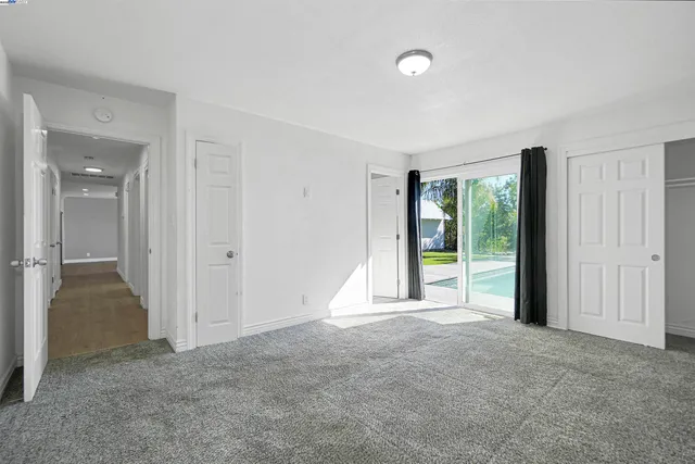a bathroom with a shower and a sink