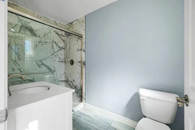 a view of a house with a swimming pool and a big yard