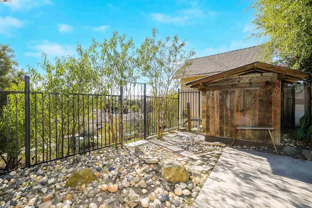 an aerial view of a house with a ocean view