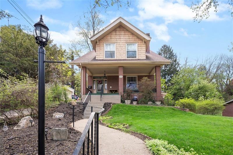 508 Cascade Road Pittsburgh, PA 15221 - Photo 1 of 37 a front view of a house with garden and porch