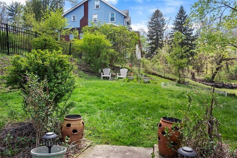 508 Cascade Road Pittsburgh, PA 15221 - Photo 34 of 37 a view of a chairs and table in backyard