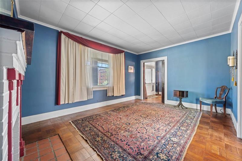 508 Cascade Road Pittsburgh, PA 15221 - Photo 7 of 37 a living room with a rug