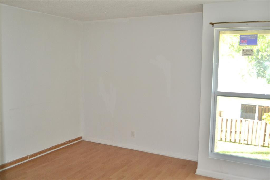 8237 Northwest 8th Court, Unit 4 Plantation, FL 33324 - Photo 13 of 24 a view of an empty room with a window