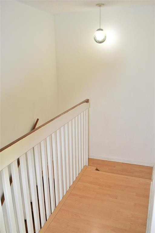 8237 Northwest 8th Court, Unit 4 Plantation, FL 33324 - Photo 14 of 24 a view of a hallway with wooden floor