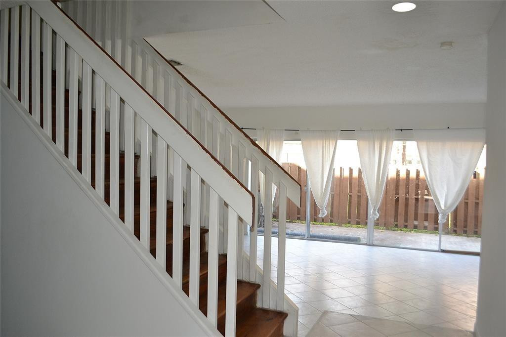 8237 Northwest 8th Court, Unit 4 Plantation, FL 33324 - Photo 16 of 24 a view of an entryway with staircase