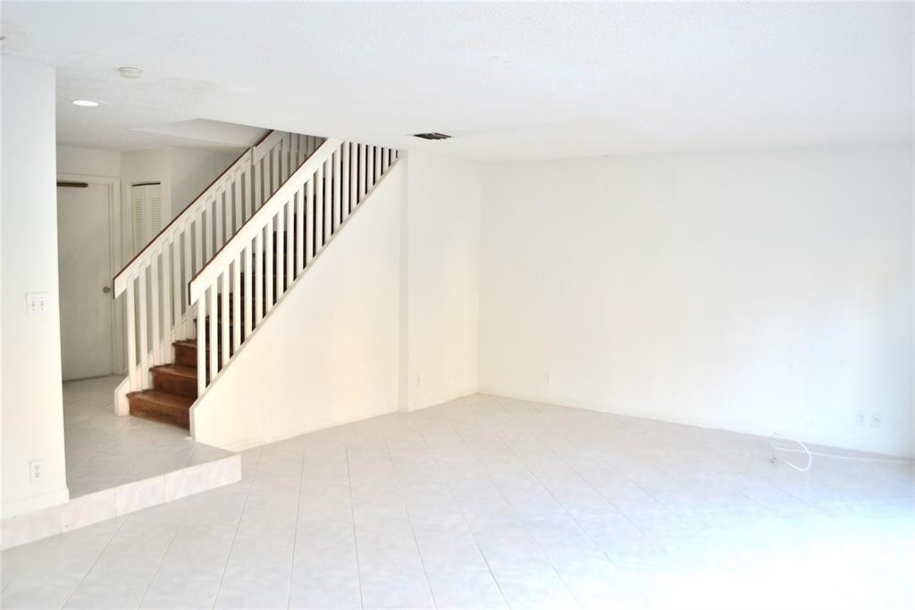 8237 Northwest 8th Court, Unit 4 Plantation, FL 33324 - Photo 6 of 24 a view of an entryway with staircase