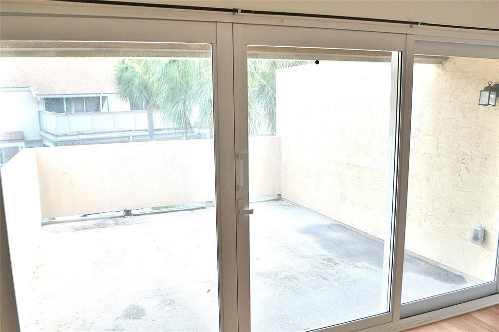 8237 Northwest 8th Court, Unit 4 Plantation, FL 33324 - Photo 7 of 24 a view of a window in a room