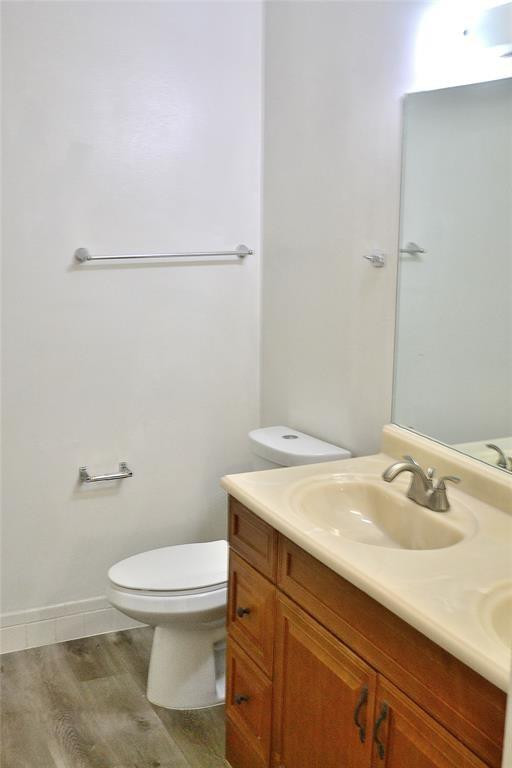 8237 Northwest 8th Court, Unit 4 Plantation, FL 33324 - Photo 9 of 24 a bathroom with a sink toilet and vanity