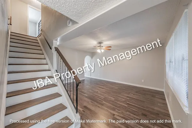 a kitchen with stainless steel appliances granite countertop a stove a sink and a granite counter tops