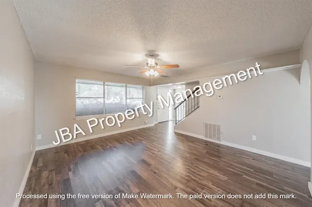 a kitchen with a stove and a sink