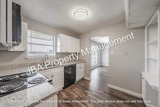 a view of a hallway with a window