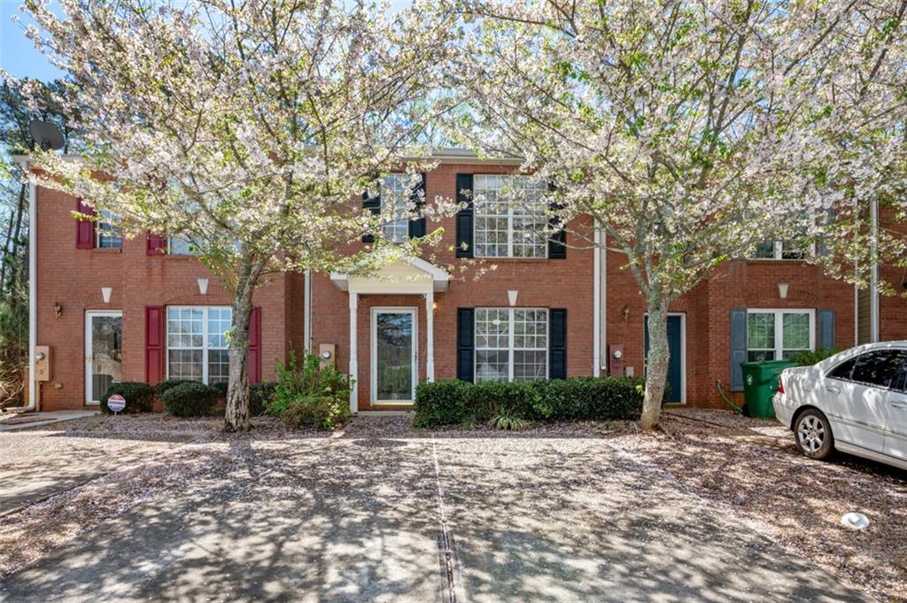 3818 Waldrop Lane Decatur, GA 30034 - Photo 1 of 1 a front view of a building with garden