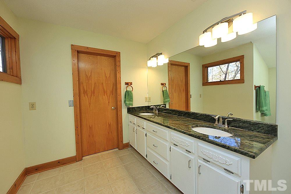 11716 Appaloosa Run East Raleigh, NC 27613 - Photo 13 of 30 Large dual vanity has ample storage.