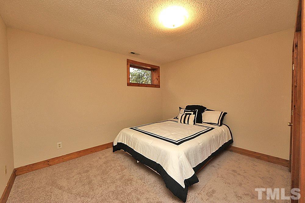 11716 Appaloosa Run East Raleigh, NC 27613 - Photo 23 of 30 An additional room in the finished basement perfect for work, sleep or play.
