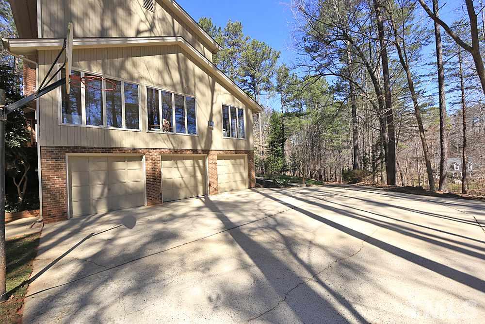 11716 Appaloosa Run East Raleigh, NC 27613 - Photo 26 of 30 Oversized parking pad perfect for multiple vehicles.