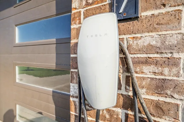a view of front door with wooden floor