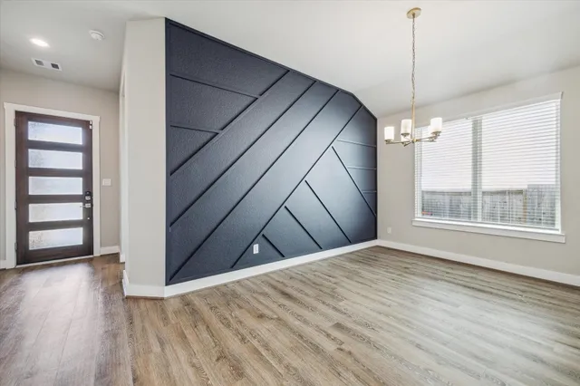 a kitchen with stainless steel appliances granite countertop a refrigerator oven a sink and dishwasher