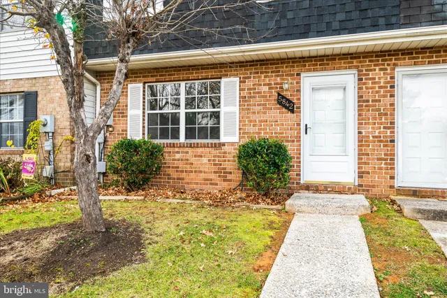 a front view of a house having yard