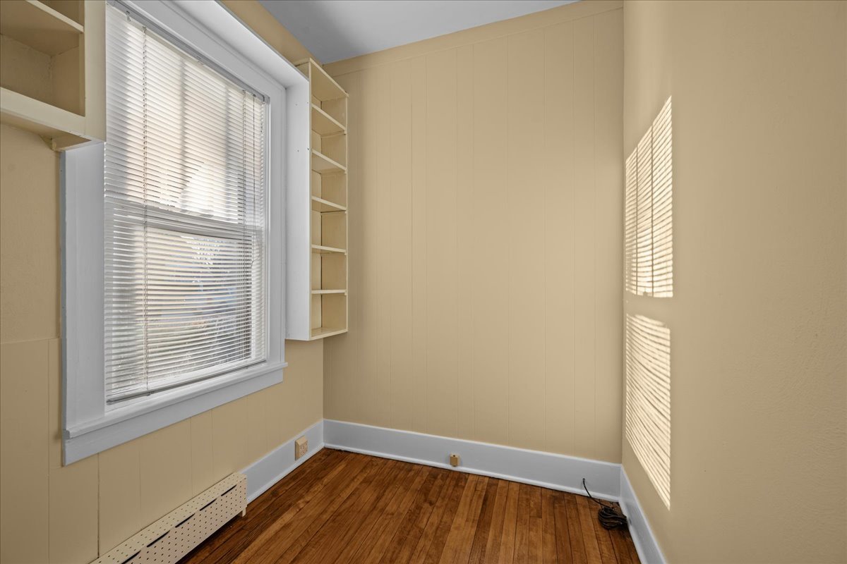 1211 Griffith Road Lake Forest, IL 60045 - Photo 10 of 15 a view of an empty room with wooden floor and a window
